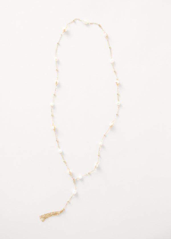 Pearl on gold chain necklace with tassel detail