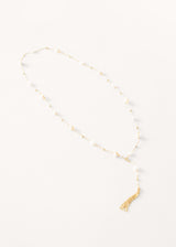 Pearl on gold chain necklace with tassel detail