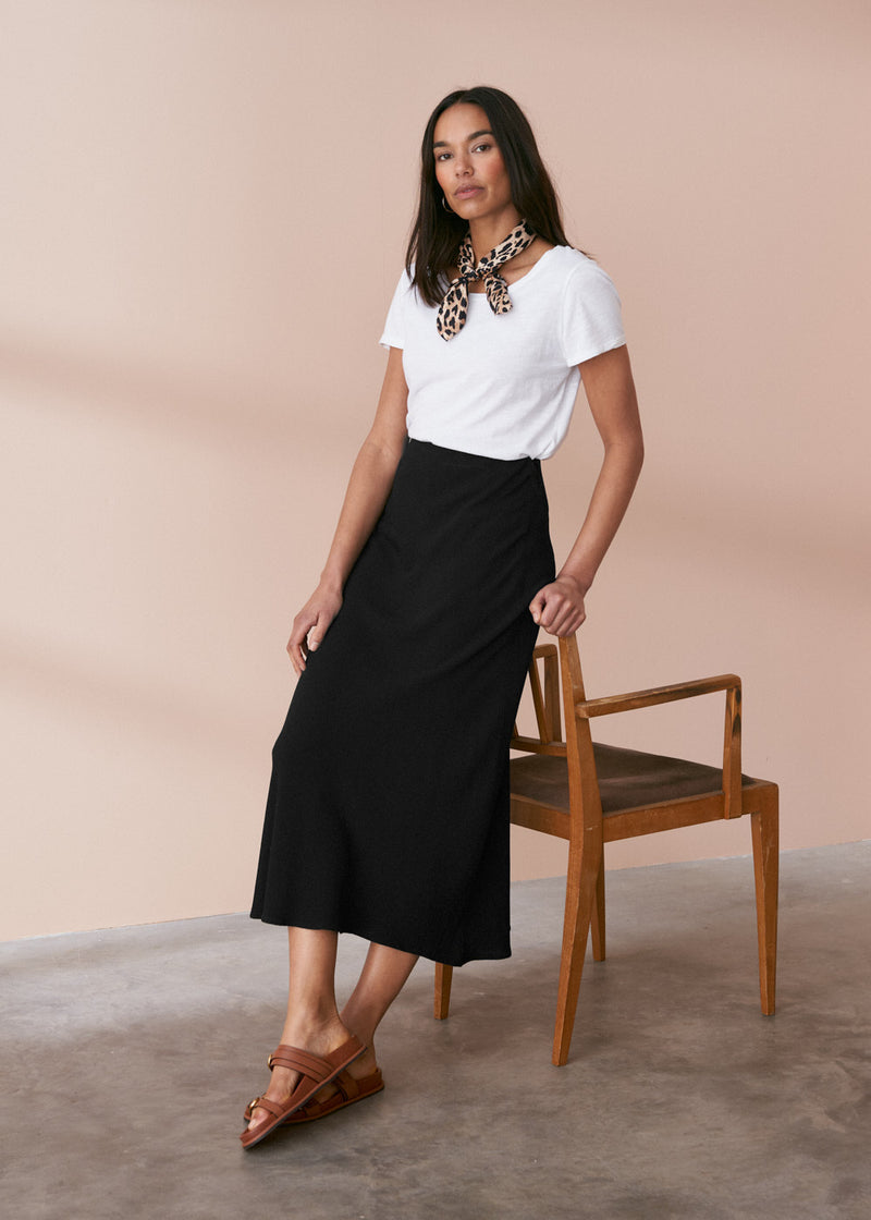 Black bias cut crepe midi skirt