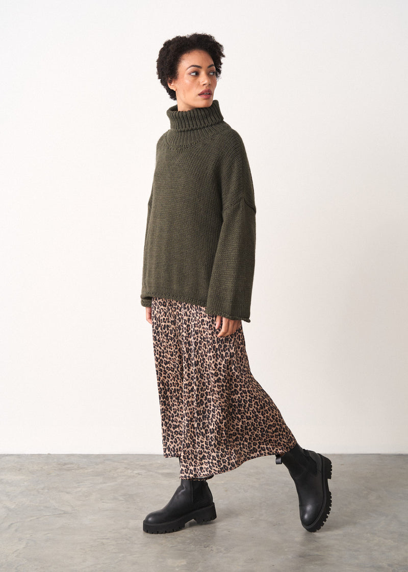 Dark green roll neck jumper