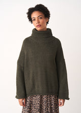 Dark green roll neck jumper