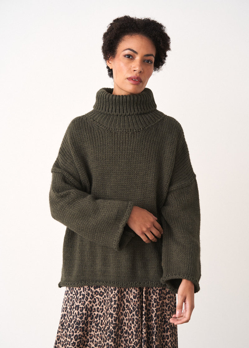 Dark green roll neck jumper