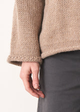 Stone roll neck jumper