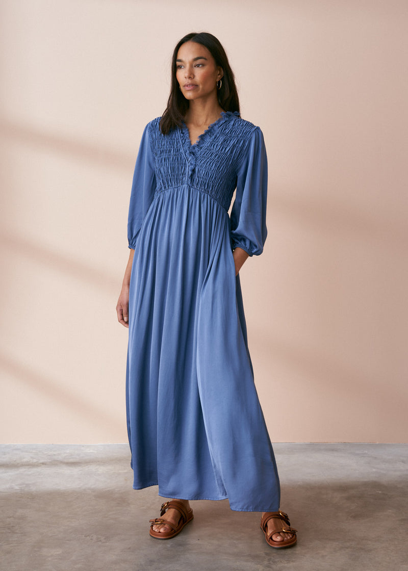 Maxi length satin dress in cornflower blue with shirring detail