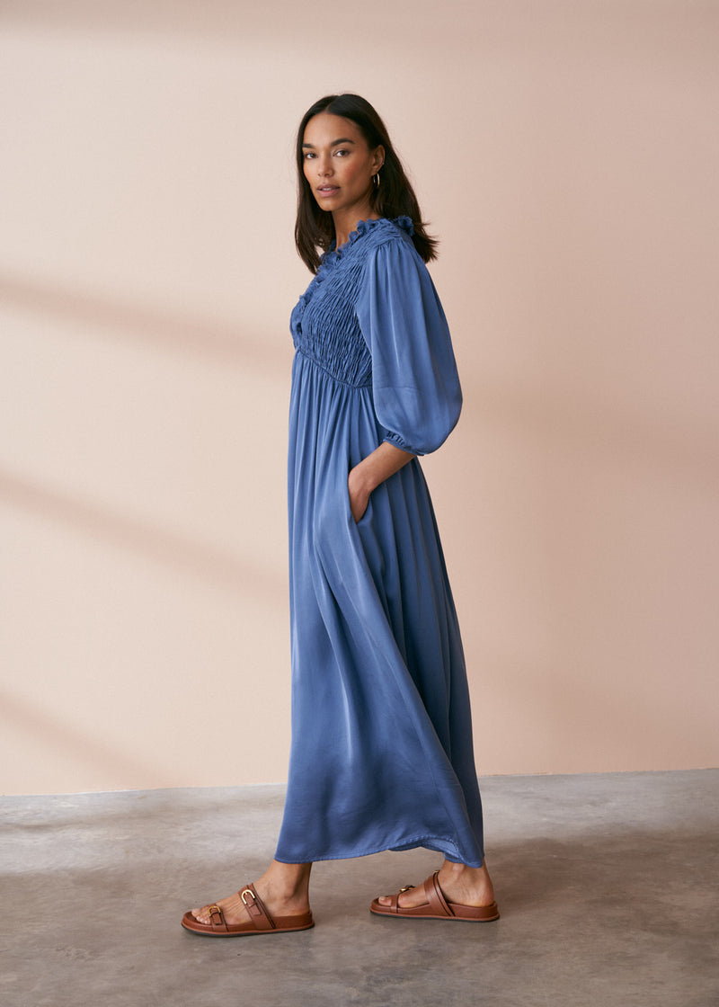 Maxi length satin dress in cornflower blue with shirring detail