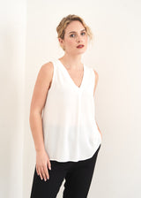 White sleeveless vest top