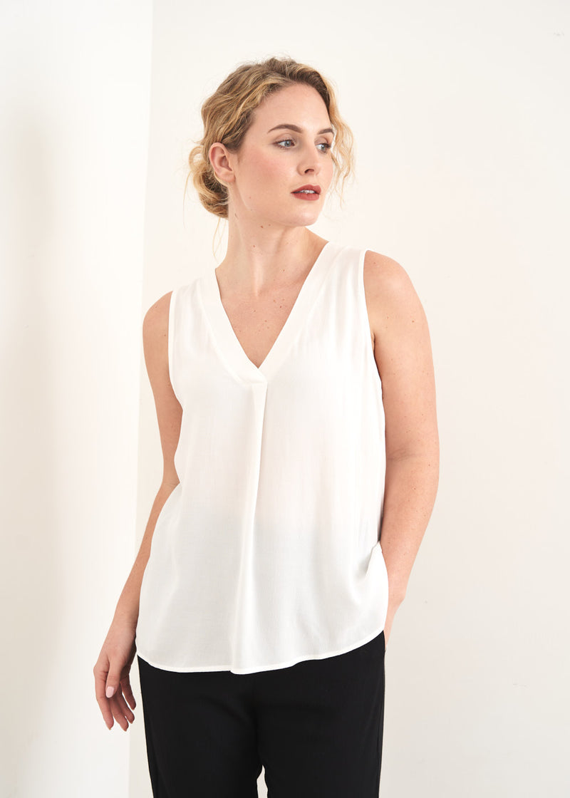 White sleeveless vest top