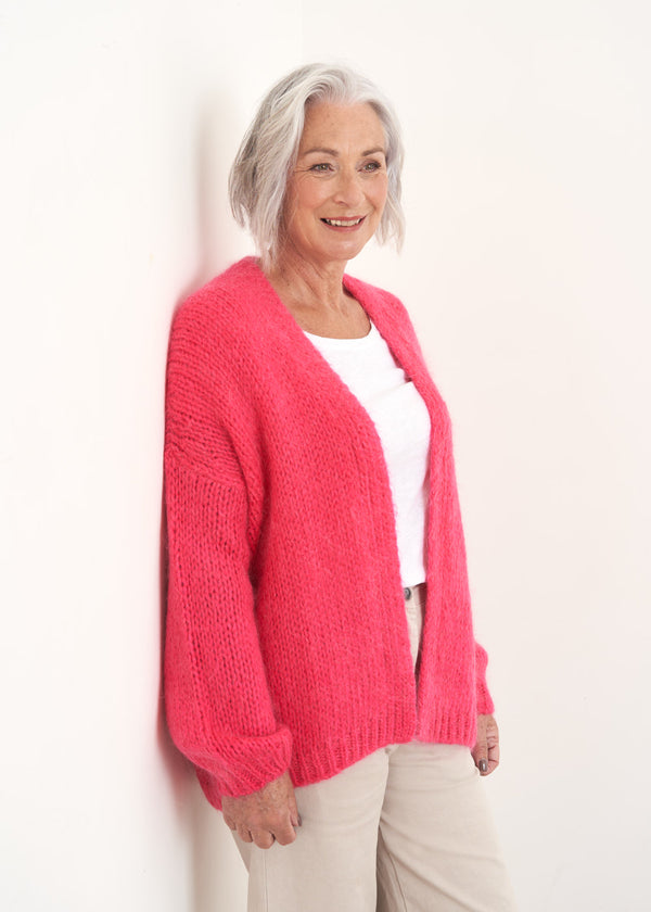Bright pink chunky knit cardigan