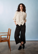 black wide leg raw hem cotton trousers