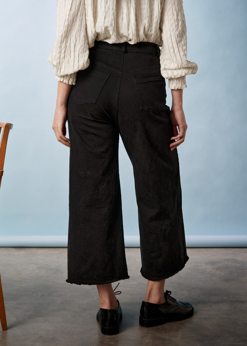 black wide leg raw hem cotton trousers