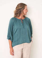 Teal satin tassel tie blouse