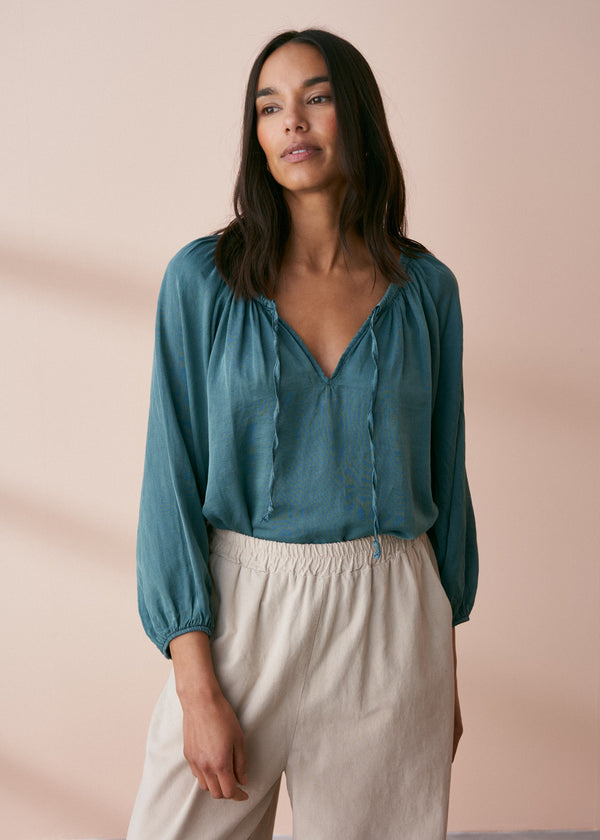 Teal silk tassel tie blouse