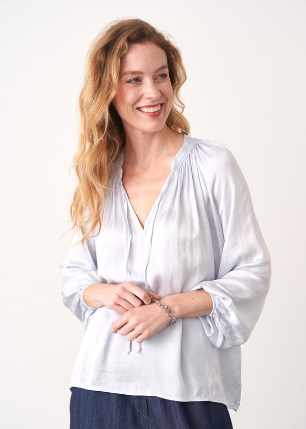 Pale blue satin top with neck tie