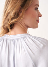 Pale blue satin top with neck tie