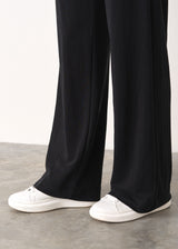 Black long leg jersey flared trousers