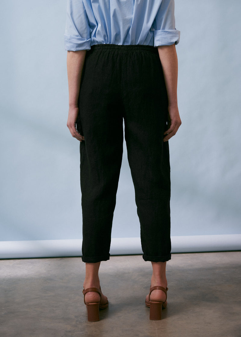 Black tapered linen trousers