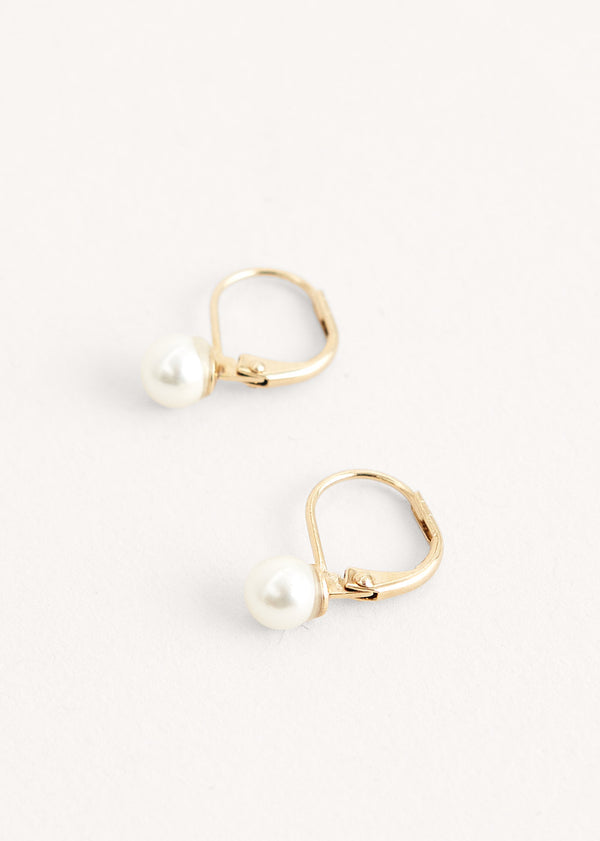 Gold hoop earrings with white pearl