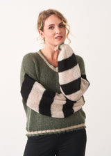 Khaki sweater with black and white stripe sleeves