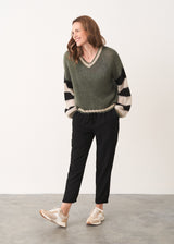 Khaki sweater with black and white stripe sleeves