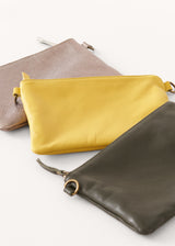 Acid yellow leather clutch bag