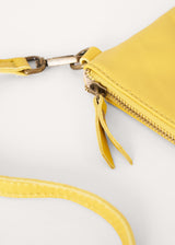 Acid yellow leather clutch bag