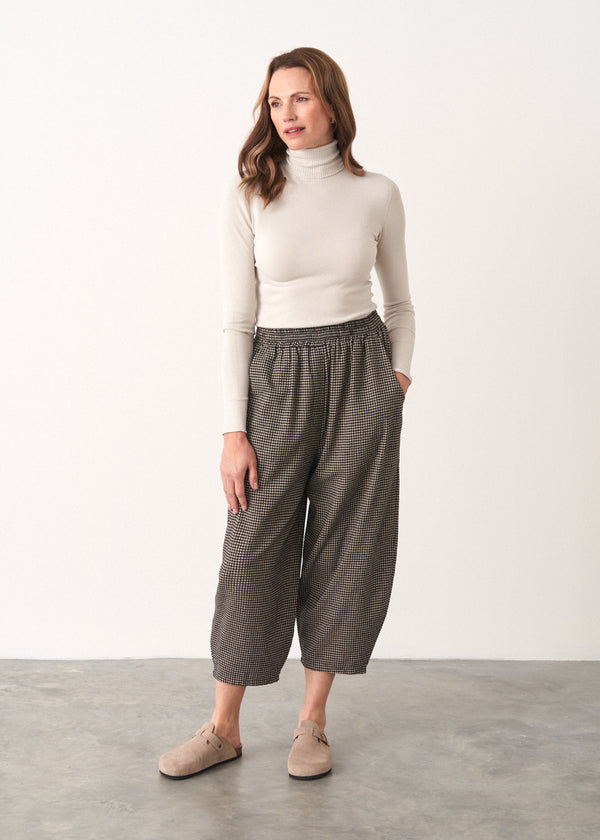 Black and white check barrel leg trousers