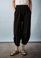 Black cropped jersey trousers