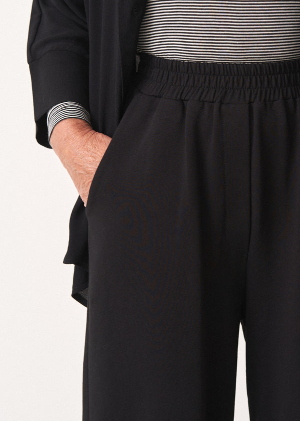 Black cropped jersey trousers