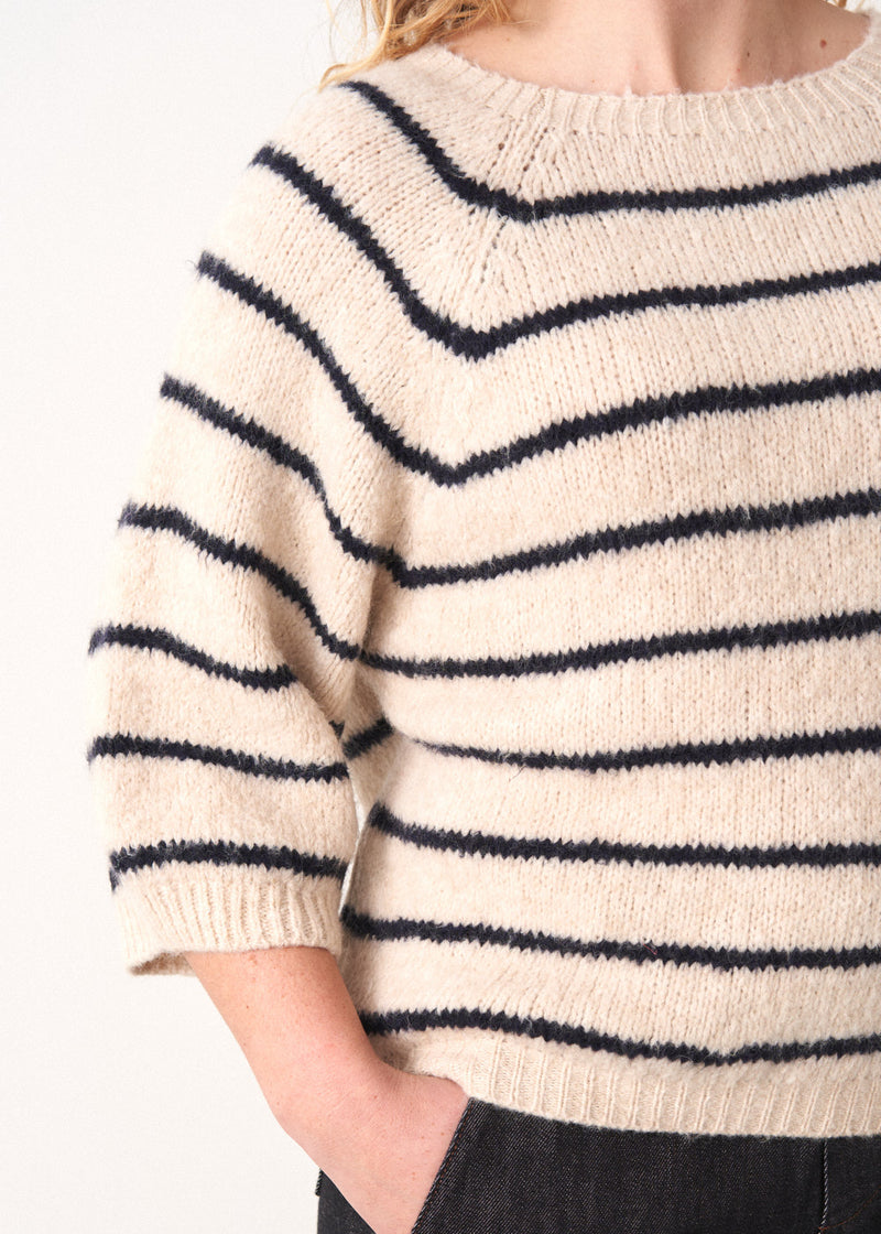 Light oatmeal sweater with cropped sleeves and navy stripe