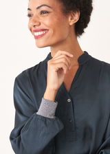 Dark blue satin top with glitter cuffs