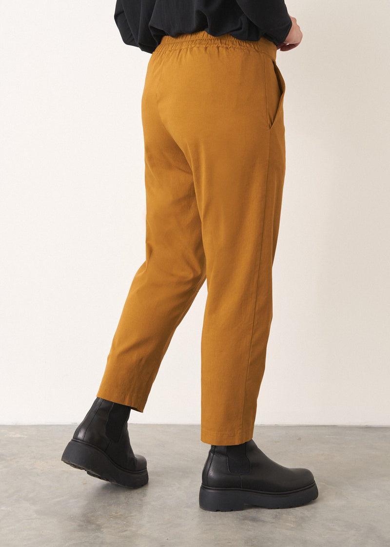 Mustard yellow cotton tapered trousers