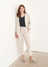 Light oatmeal drawstring trousers and jacket co ord