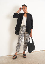 Light oatmeal leopard print trousers and Black cotton shirt