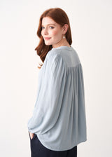 Pale blue long sleeve shirt