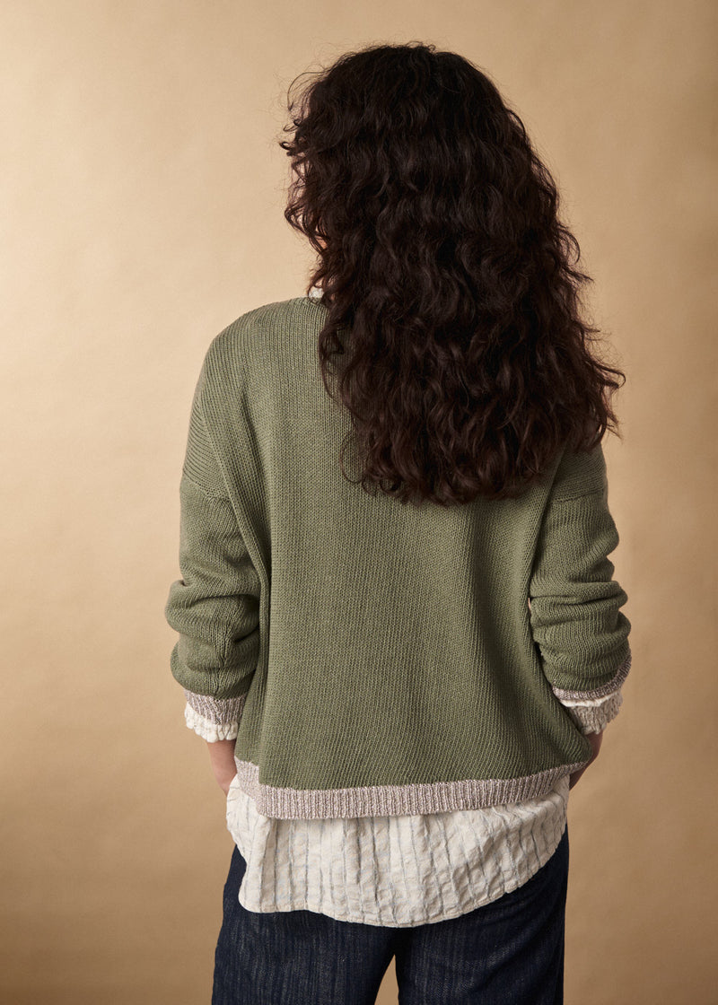 Light khaki sweater with silver trim detail