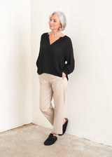 Black cotton long sleeve top and Light oatmeal cotton trousers