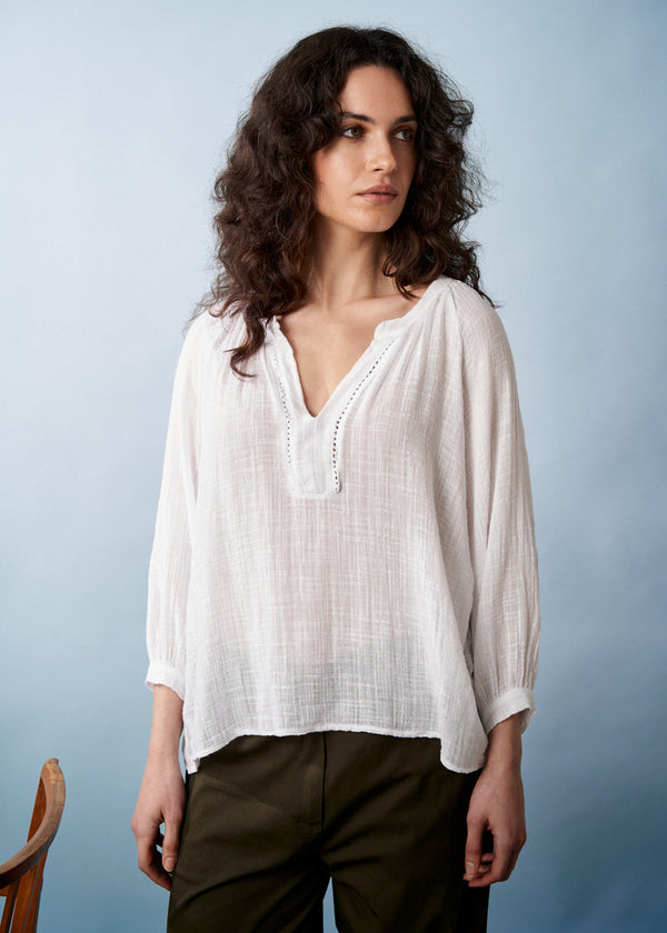 White cotton top with embroidered detail