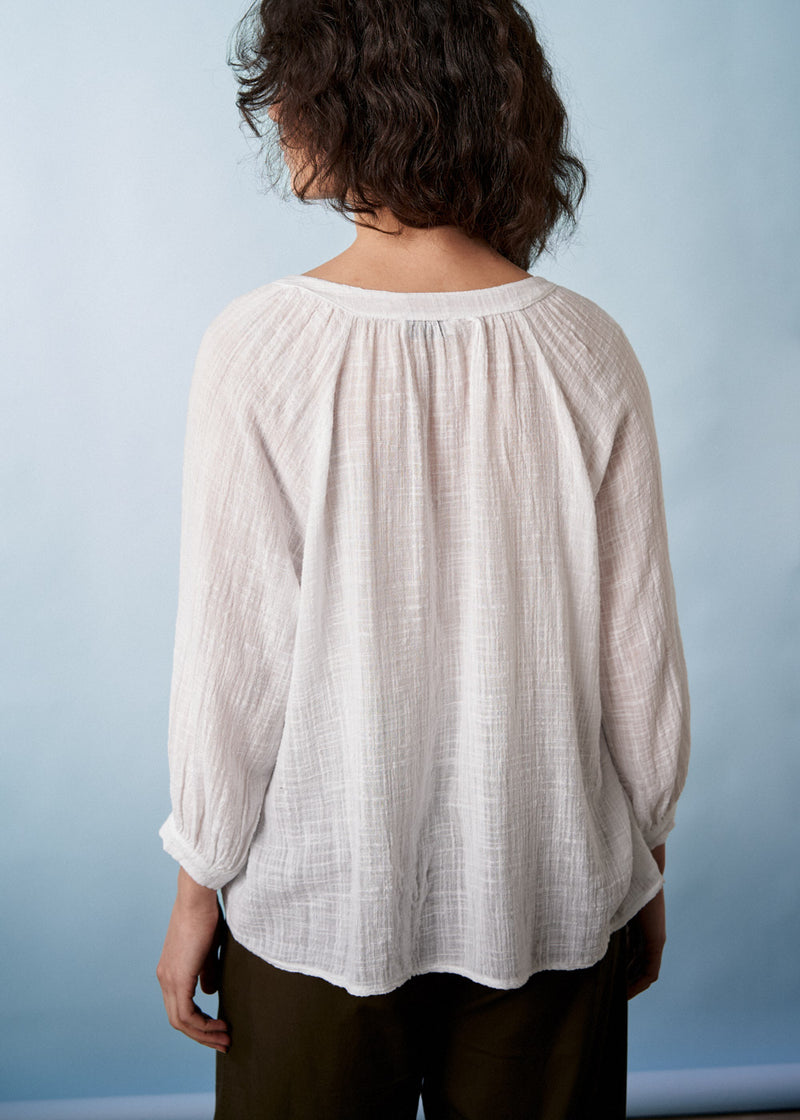 White cotton top with embroidered detail