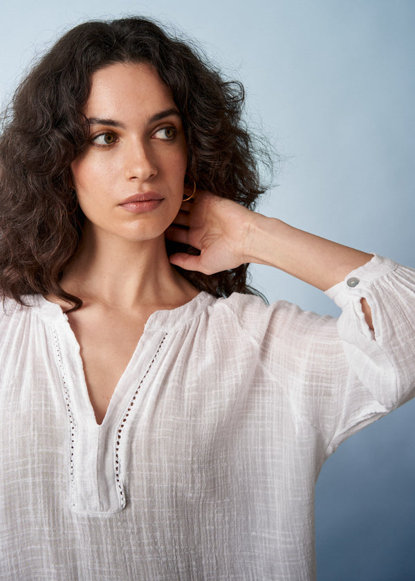 White cotton top with embroidered detail