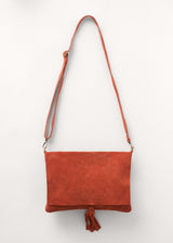 Suede rust flap bag with tassel