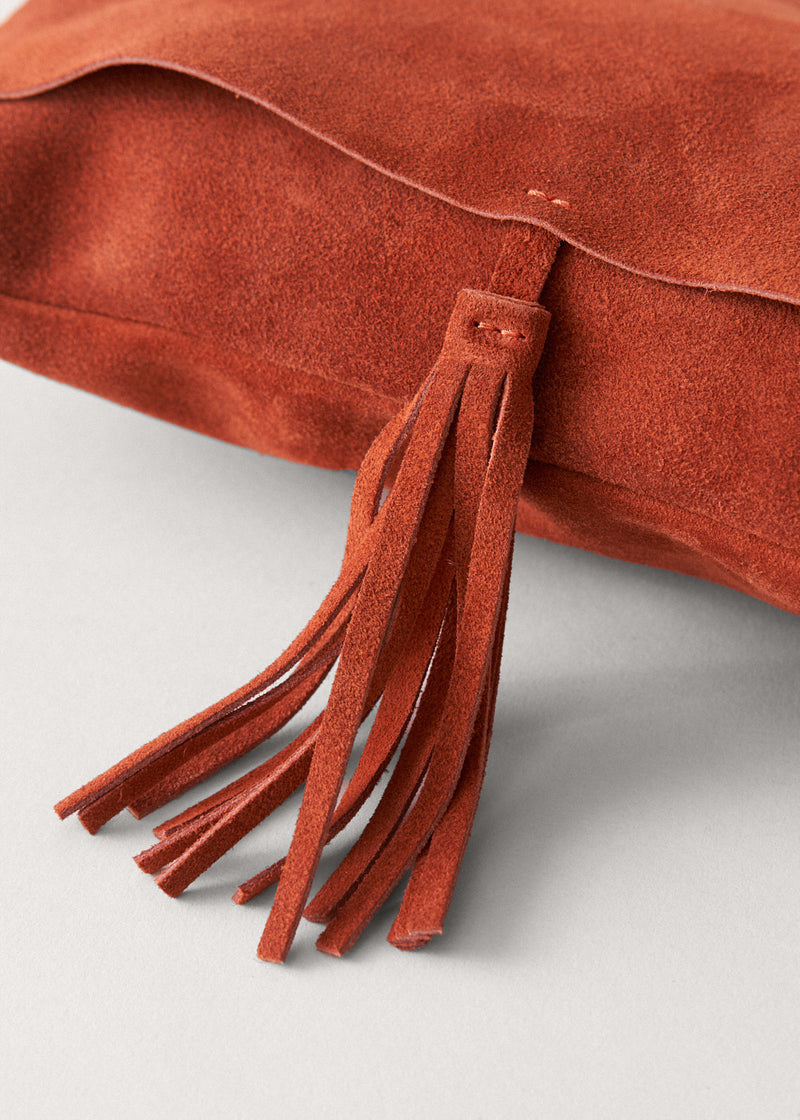 Suede rust flap bag with tassel