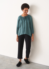 Teal satin tassel tie blouse