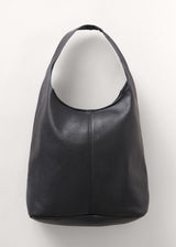 Large black leather bag with round strap