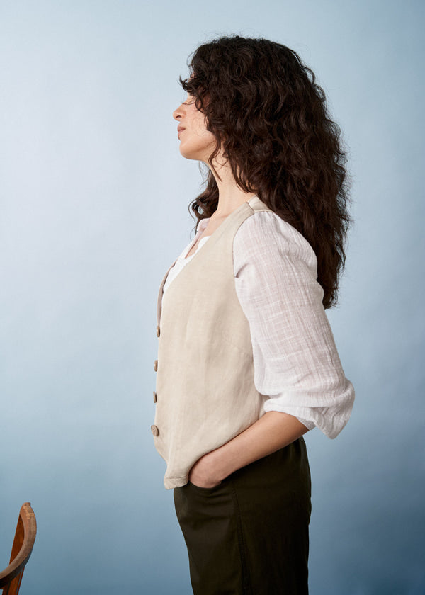 Light oatmeal waistcoat with buttons